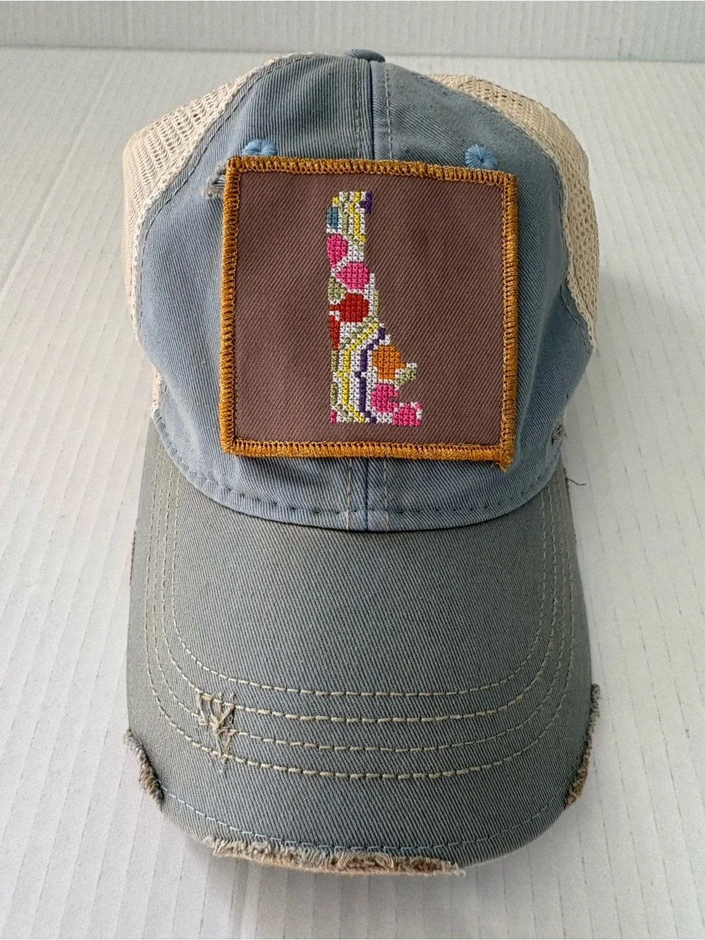 Judith March Distressed Trucker Hat state Delaware embroidery Patch blue tan
